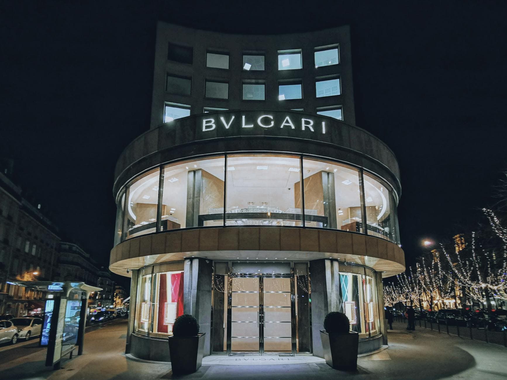 Elegant Bulgari storefront illuminated at night, capturing the essence of luxury in Paris.